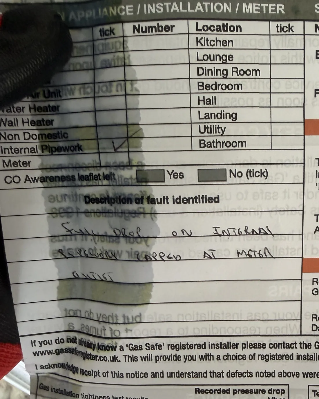 Part of the gas emergency warning notice left by Cadent, with internal pipework ticked and the fault described as a full drop on the internal pipework