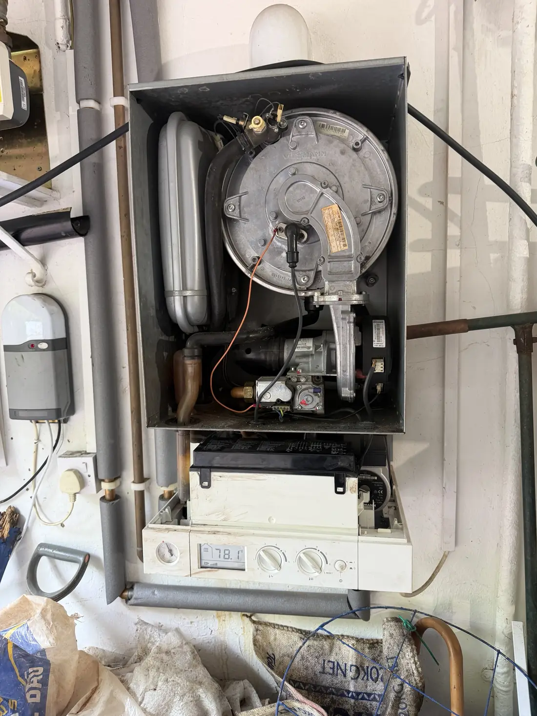 Viessmann Vitodens 100 with the front case removed showing the burner door, fan and gas valve
