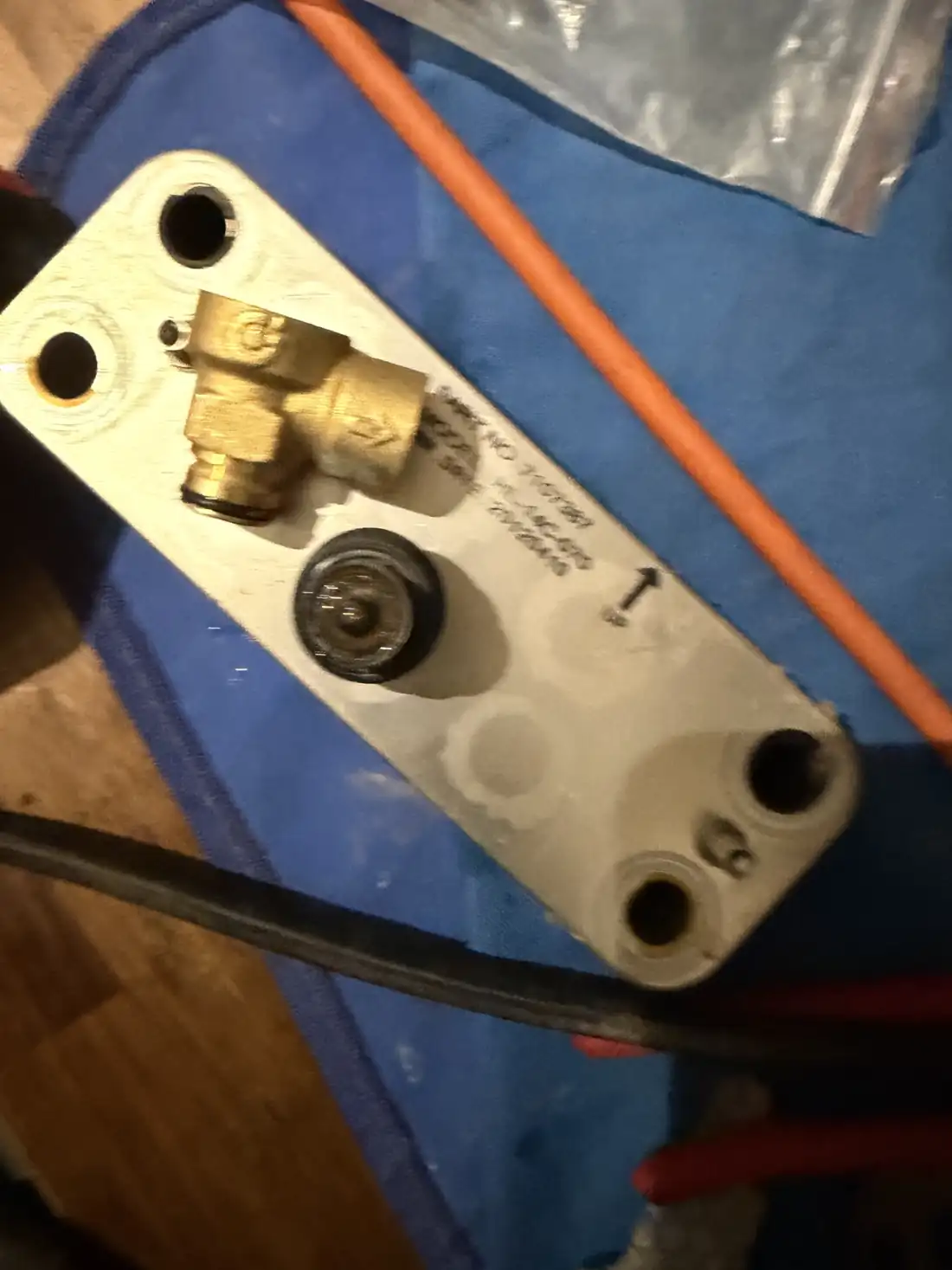 A plate heat exchanger removed from a Potterton Gold combi boiler
