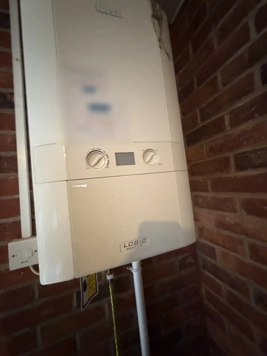 The old Ideal Logic Heat 18 boiler on the wall before it was removed