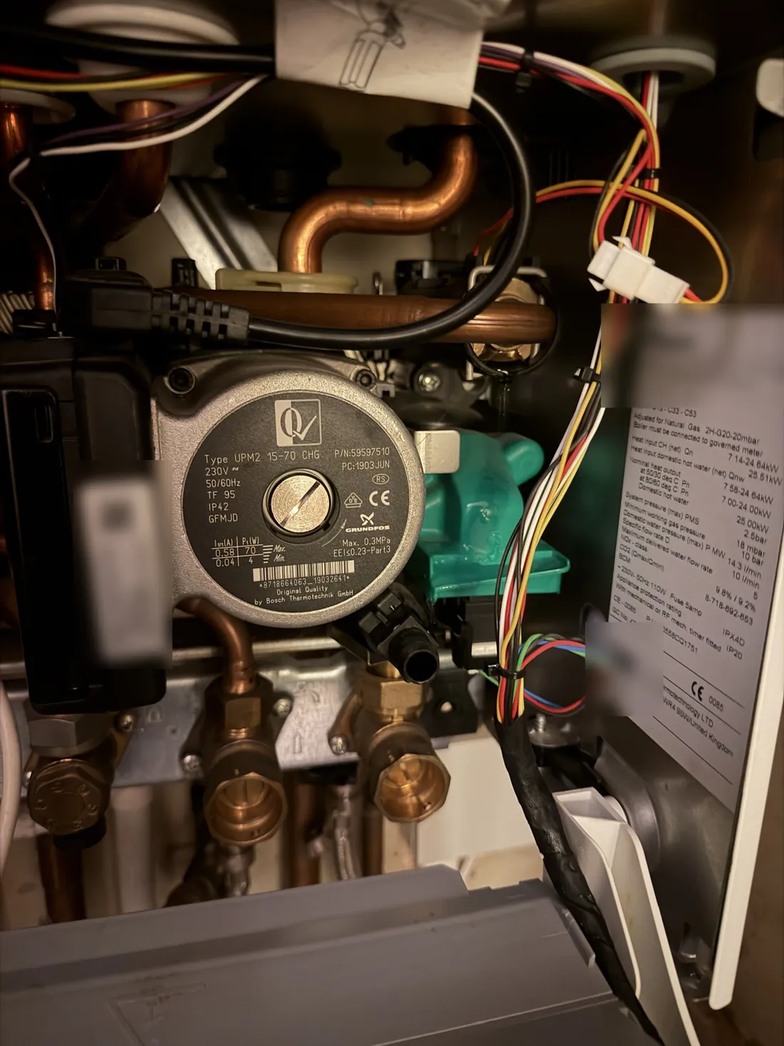 Worcester Greenstar 25i ErP combi boiler with the case off, showing the pump, hydraulics and data plate
