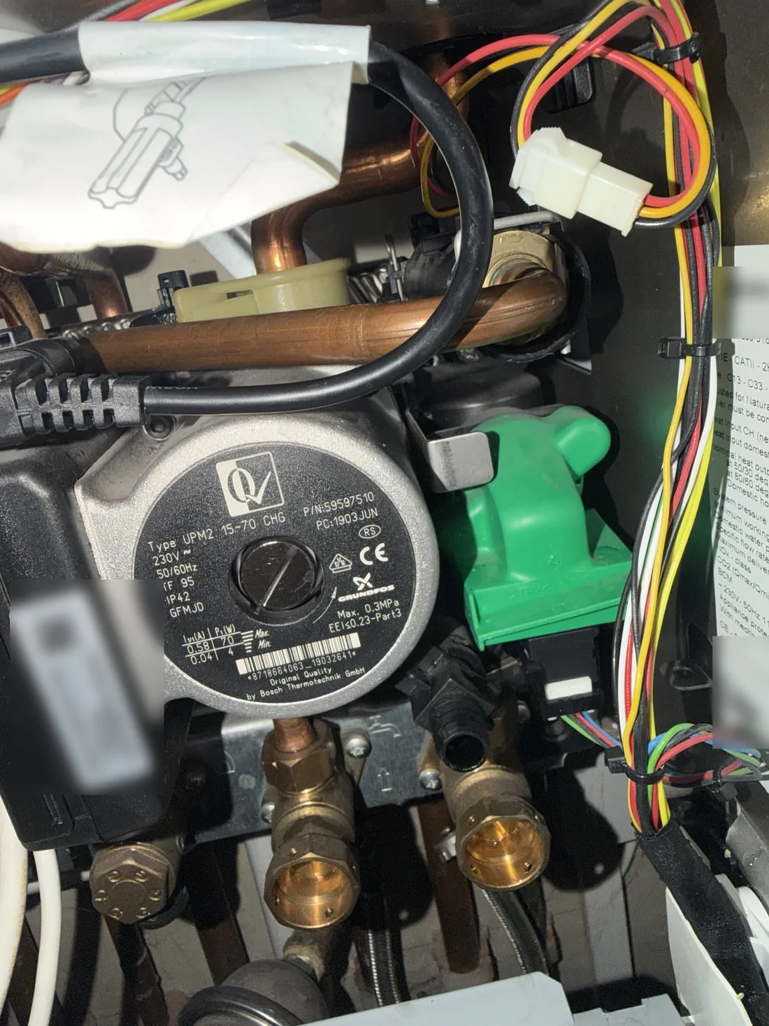 Worcester Greenstar hydraulics after the repair, with the flow pipe refitted into the right-hand manifold