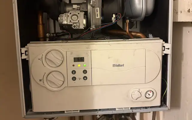 A Vaillant ecoTEC control panel showing the boiler running again in Moseley