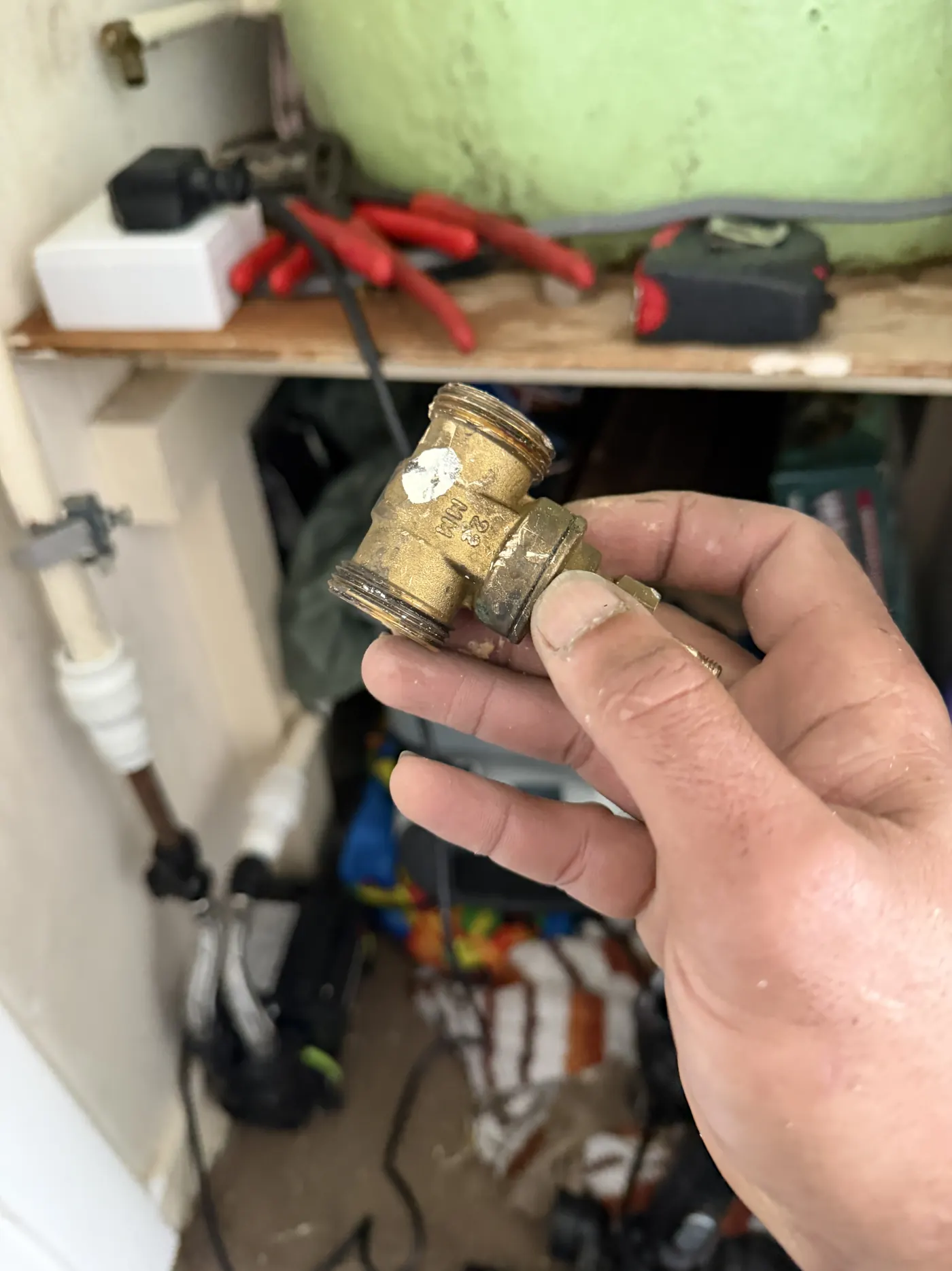 The old brass gate valve removed from the hot water cylinder pipework in the Oldbury flat