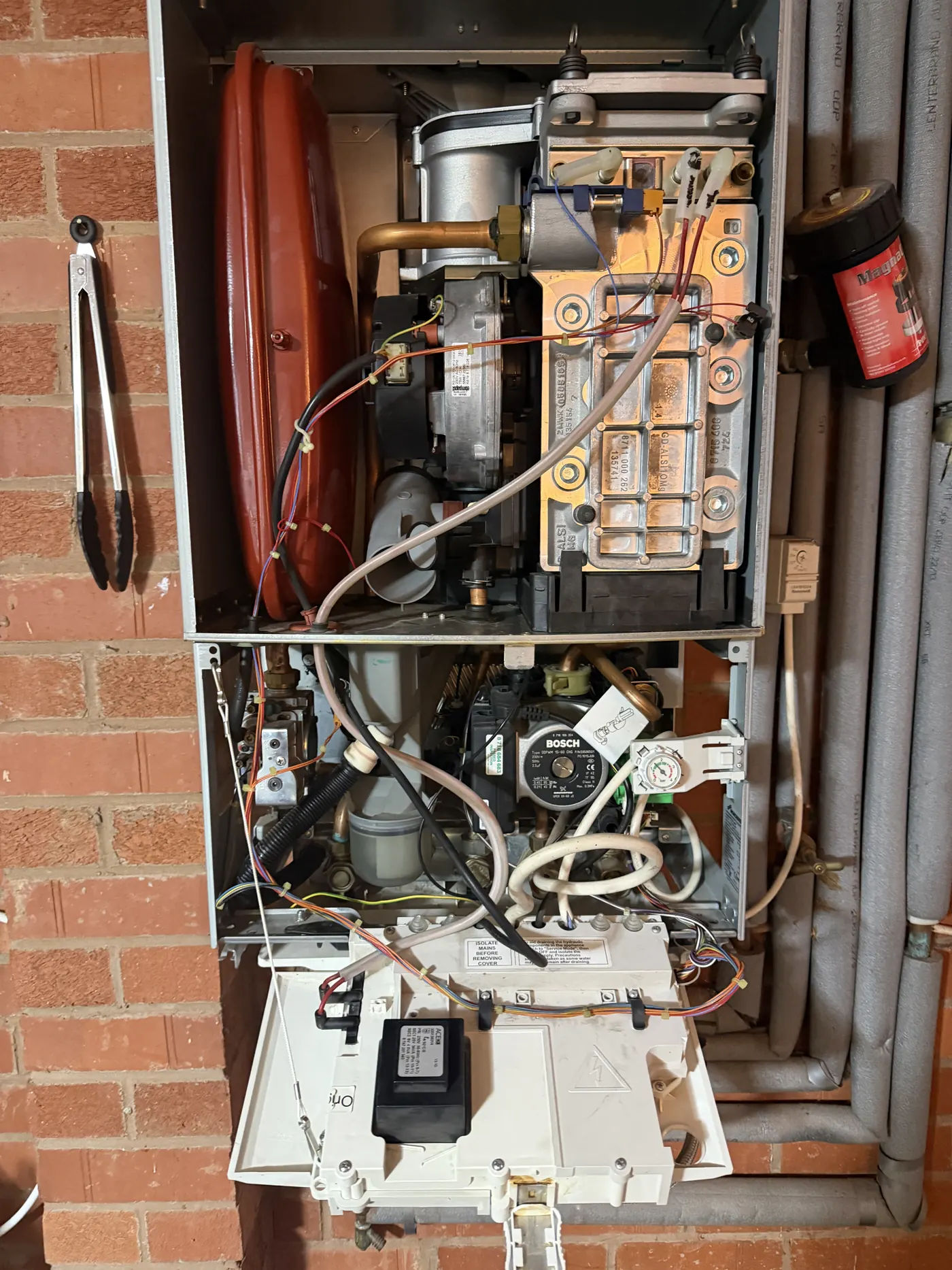 Worcester CDi with the fan and burner assembly removed and set to one side during the repair