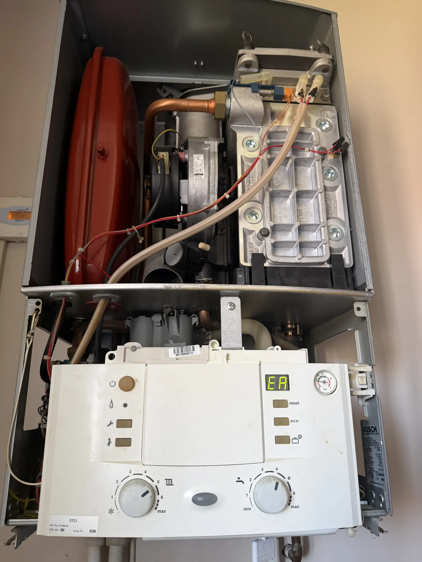 Worcester CDi boiler with the case removed showing an EA fault code on the display