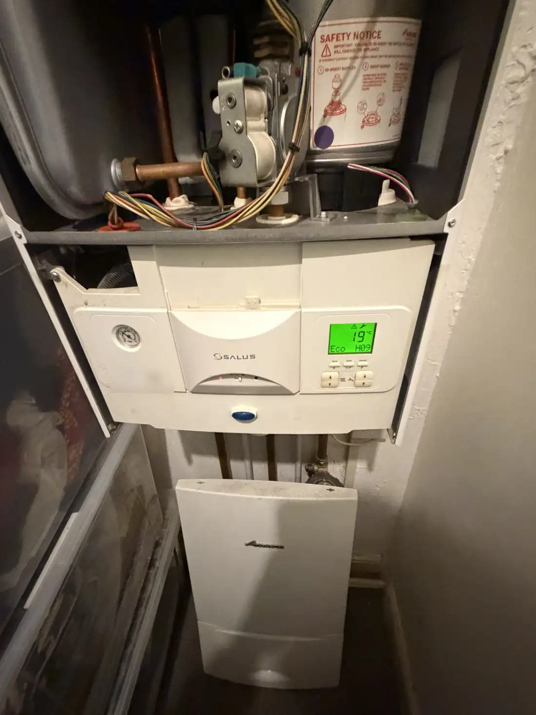 Worcester boiler display showing 19 degrees, Eco and H09 with the warning and spanner symbols