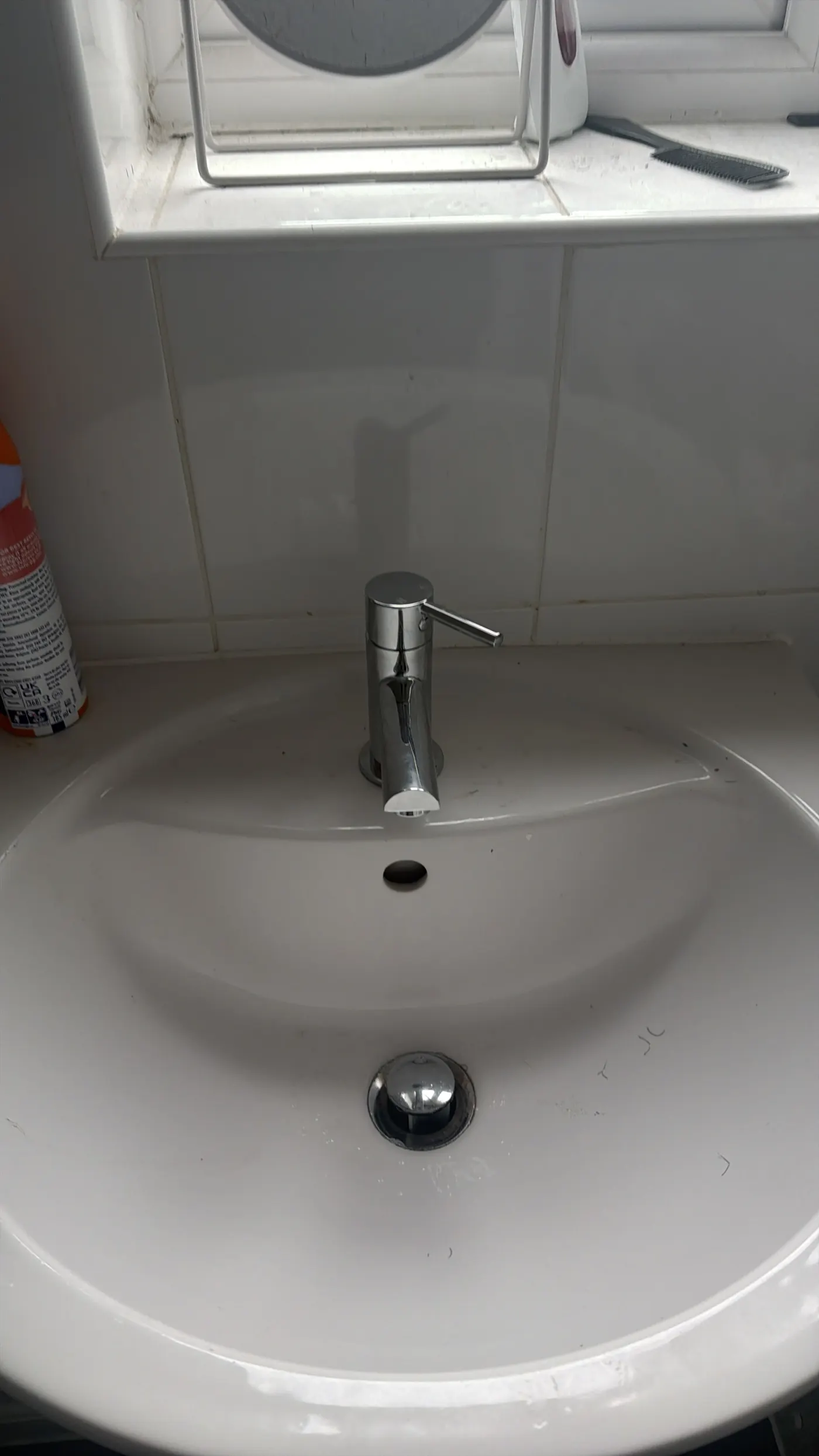New chrome mixer tap fitted to the basin in the Walsall flat after the leak repair