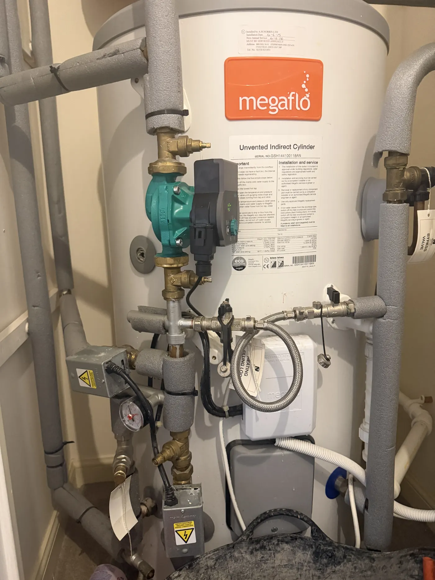 New system pump fitted beside the Megaflo cylinder after the repair