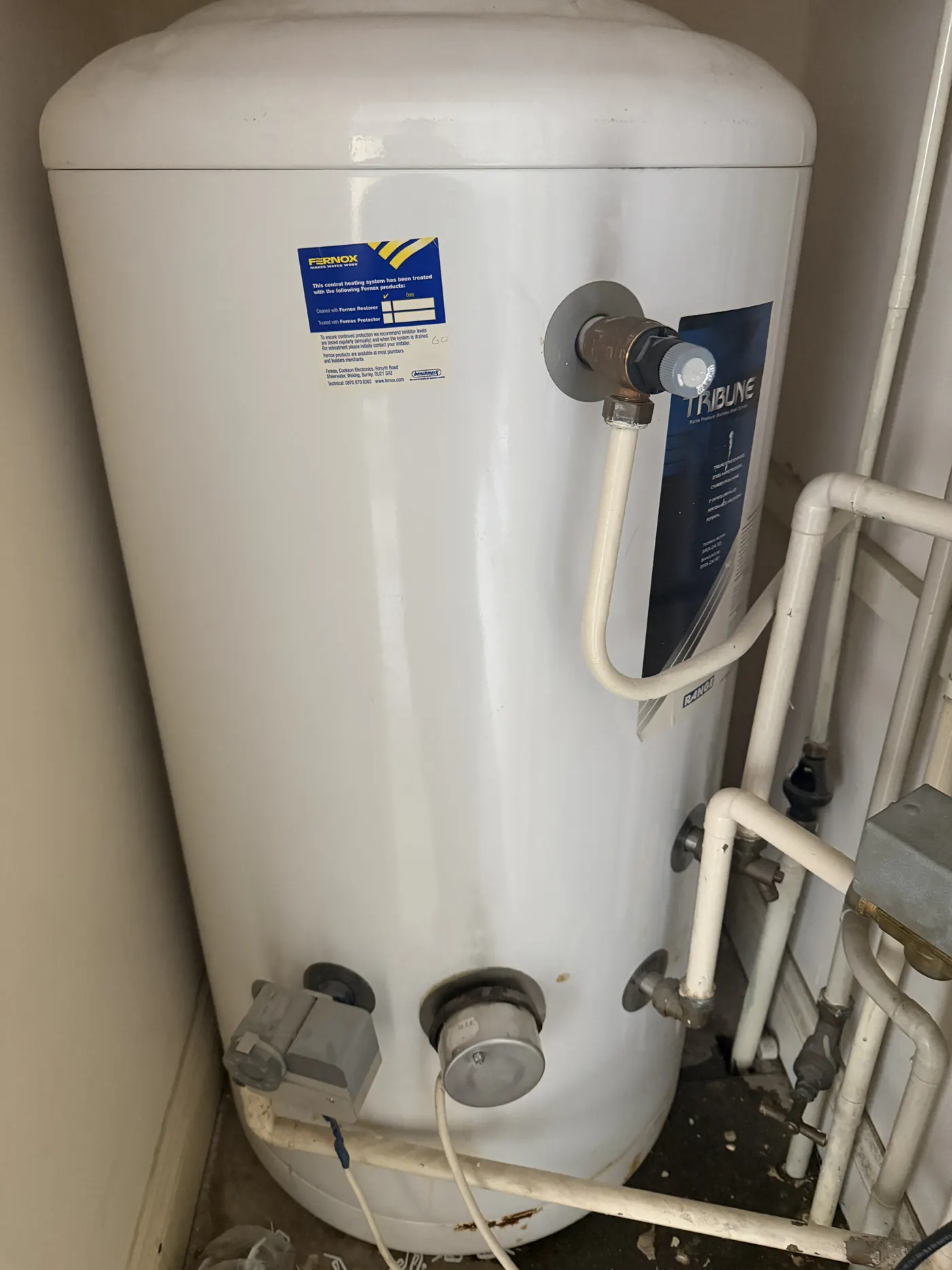 The old leaking unvented cylinder in a third-floor cupboard in Wolverhampton before replacement